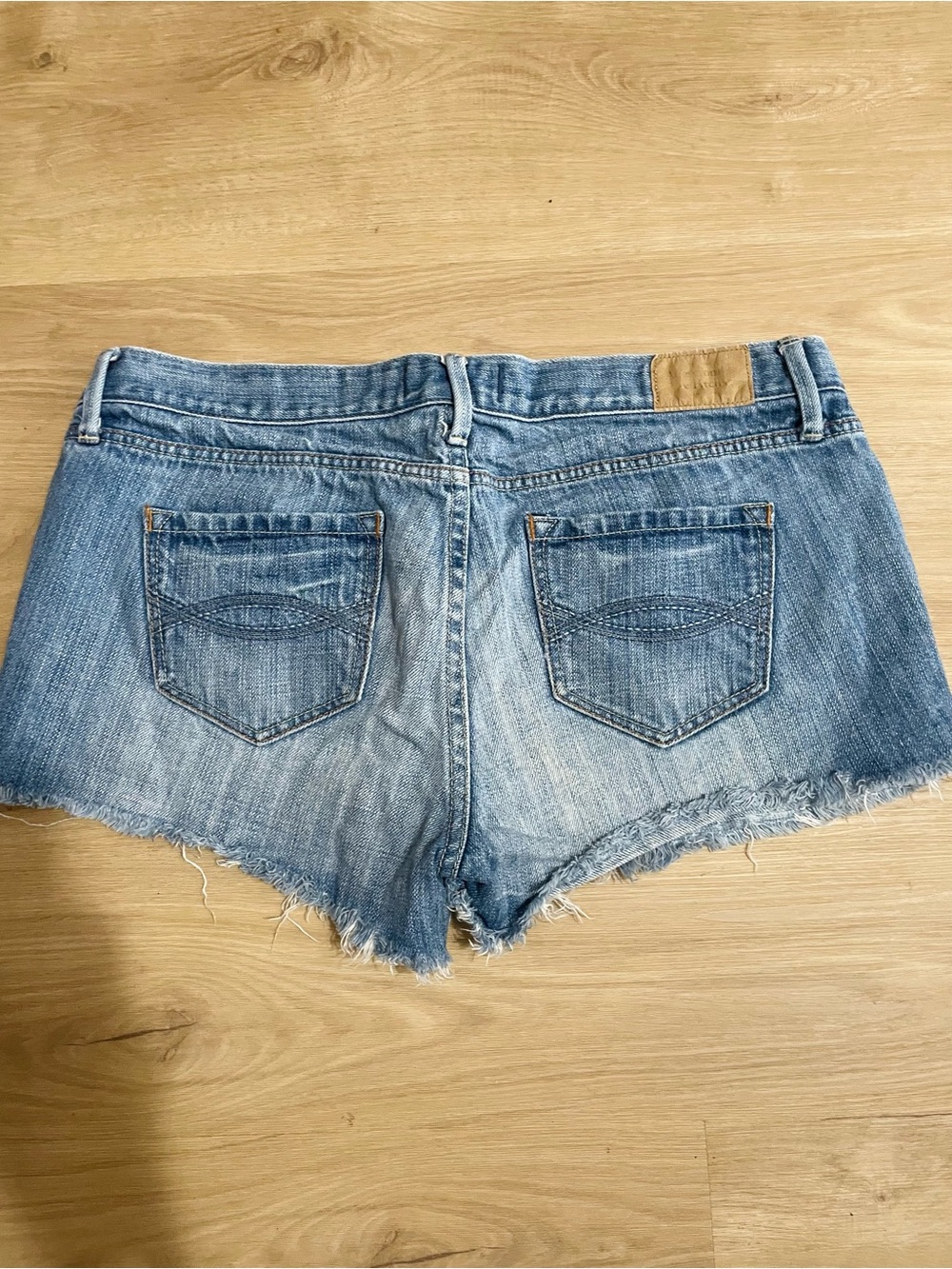 Denim Cutoff Shorts in Light Blue - Women - Picture 2 of 3